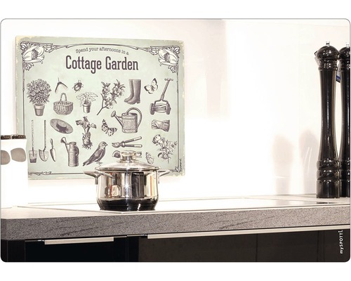 Dekorativ väggbild med trädgårdsmotiv i ett kök