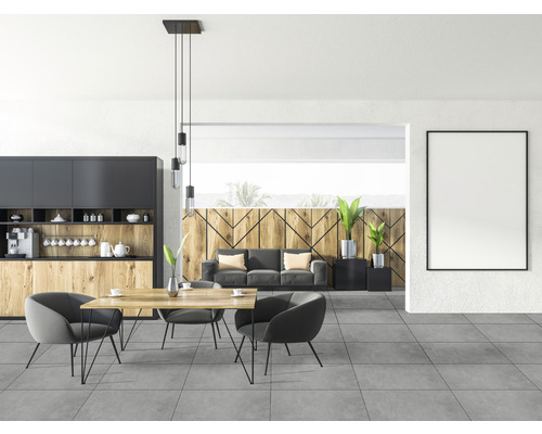 Vardagsrum med pentry, matbord och sittplatser i modern design