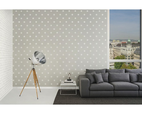 Vardagsrum med stjärntapet, soffa och golvlampa