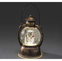 Snögloblykta med snögubbefamilj