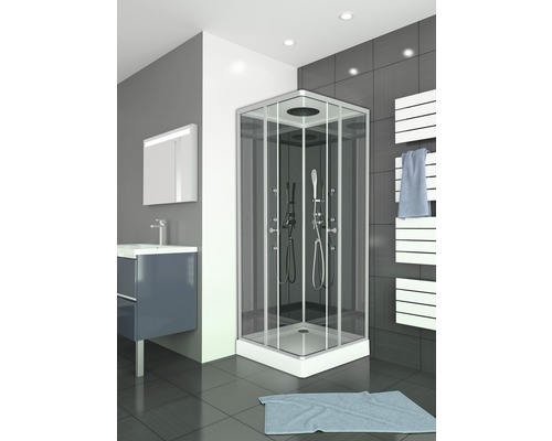 Modernt badrum med hörndusch, tvättställ och handdukstork