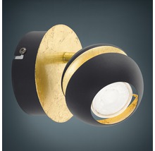 Svängbar vägglampa med rund form och guldfärgad dekoration