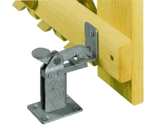 Metallgrindfångare monterad på ett trästaket