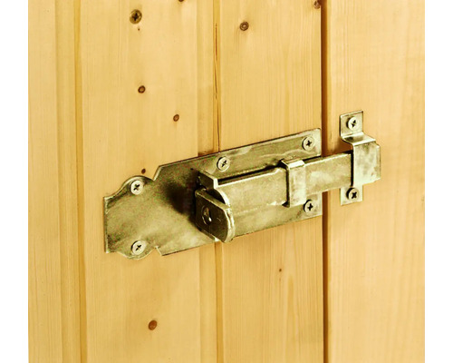 Metallås fäst på trädörr