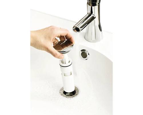 Installation av en avloppsventil i tvättstället