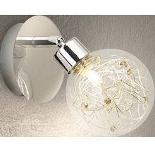 Vägglampa med rund lampskärm och inre dekoration