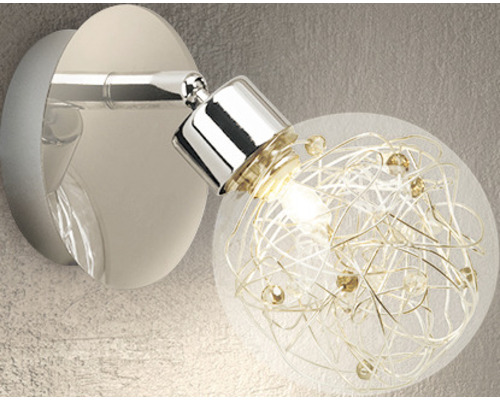 Vägglampa med rund lampskärm och inre dekoration