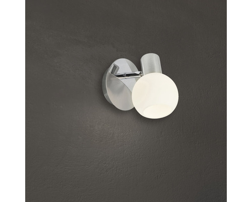 Vägglampa av metall med rund form