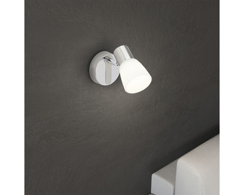 Vägglampa med justerbar spot för inomhusbruk