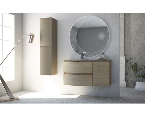 Badrum med tvättställsskåp, spegelskåp och rund spegel