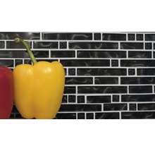 Väggplatta med mosaikmönster och gul paprika