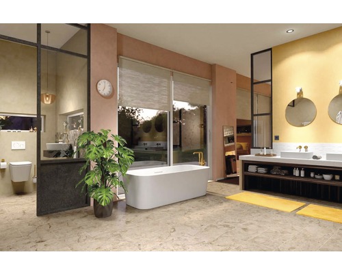 Ljust badrum med badkar, tvättställ och växt