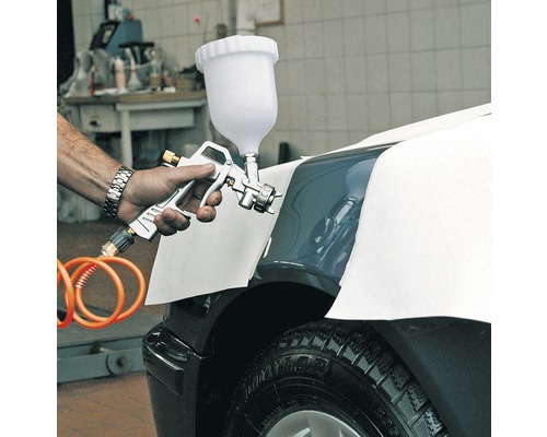 Sprutpistol som används på en bil