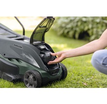 Åkgräsklippare med isatt batteri