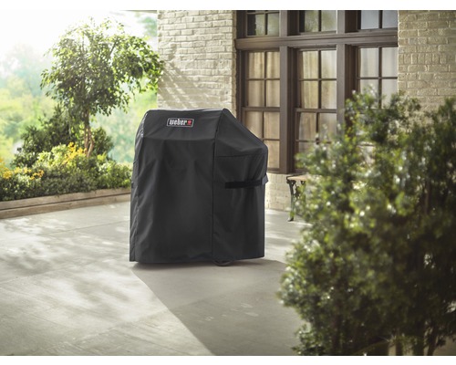 Weber logotyp på svart grillöverdrag