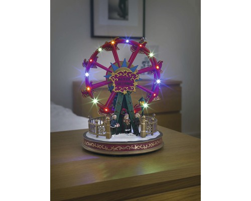 Juldekoration KONSTSMIDE Pariserhjul 29cm 19 flerfärgade LED Belyst, rörligt pariserhjul som juldekoration med figurer.