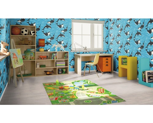 Barnrum med valtapet, skrivbord, hylla och lekmatta