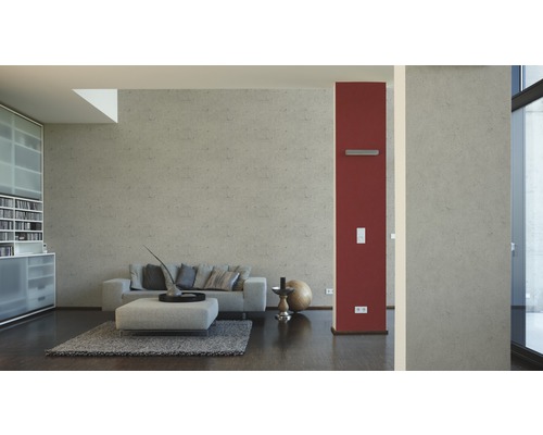 Vardagsrum med soffa, pall, matta och skåp