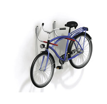 Blå cykel på ett väggfäste för cyklar