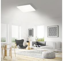 Vardagsrum med taklampa i modern stil