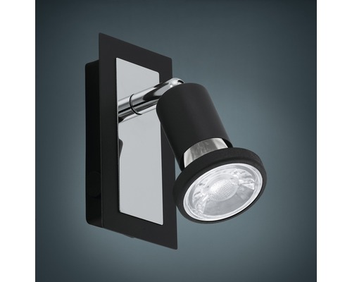 Svart vägglampa med roterbar spot