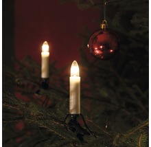 Julgran med ljusstakar och julgranskula