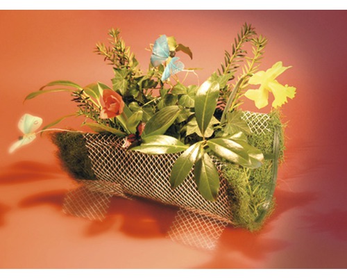 Blomsterarrangemang med blommor och dekorativa element i en behållare