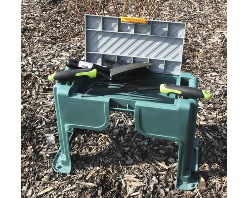 Trädgårdspall med verktygslåda och trädgårdsredskap