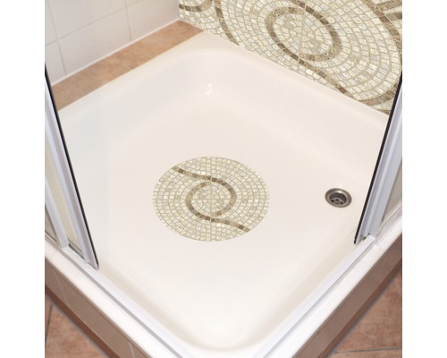 Dusch med mosaikmönster på golvet och väggen