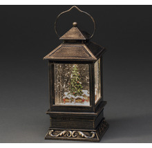 Dekorativ lykta med snökula och julgran