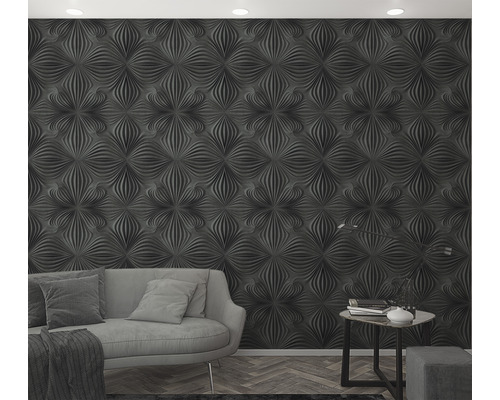 Vardagsrum med tredimensionell väggbeklädnad och soffa