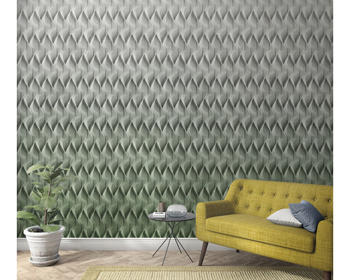 Rumsbild med tredimensionell väggpanel, soffa och krukväxt