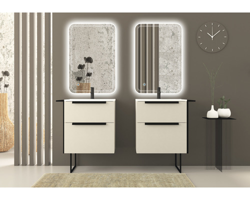 Badrum med två tvättställ, belysta speglar och minimalistisk design