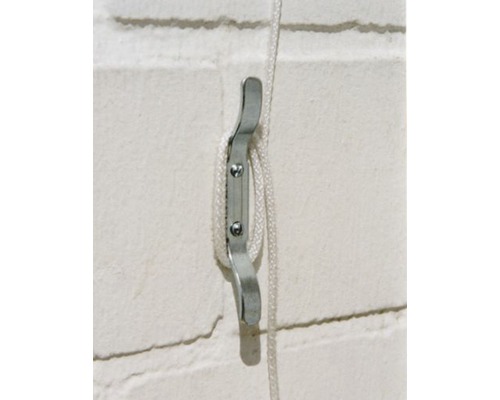 Snörvinda av metall för förvaring av rullgardinsband på väggen