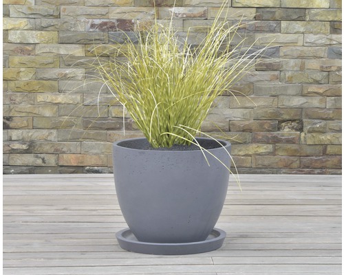 Blomkruka med fat och plantering