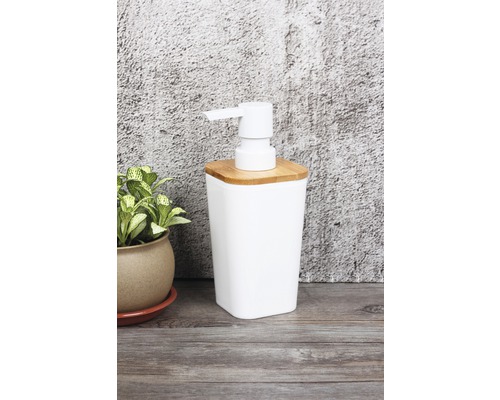 Vit tvålautomat med bambulock