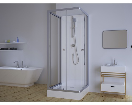 Modernt badrum med duschkabin, badkar, tvättställ och spegel