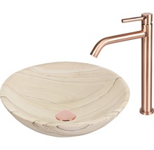 Tvättställ av sten med blandare