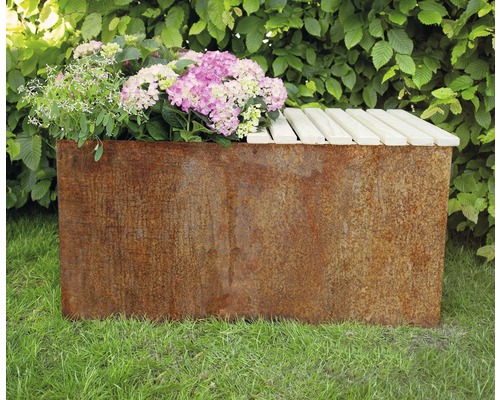 Metallblomlåda med trälock och blommor