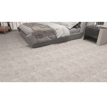 Ljust sovrum med lagt golvkakel