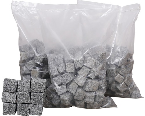 Tre säckar gatstenar av granit