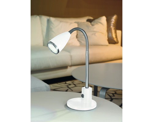 Vit LED-bordslampa med flexibel arm på ett bord