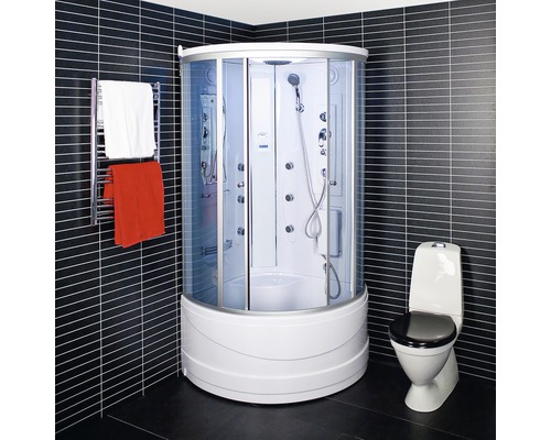 Komplett duschkabin med toalett och handdukstork i ett badrum