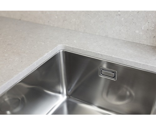 Rostfri diskho i en köksbänk