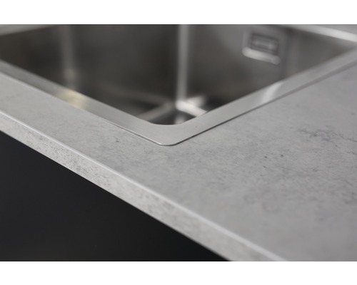 Rostfri diskho i en bänkskiva