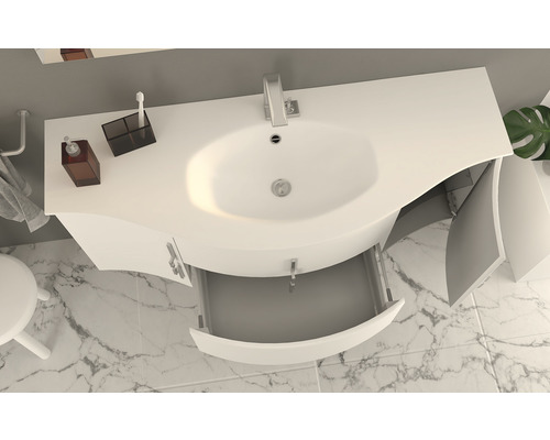 Översikt över ett badrum med ett tvättställsskåp med öppen låda och skåpdörrar.