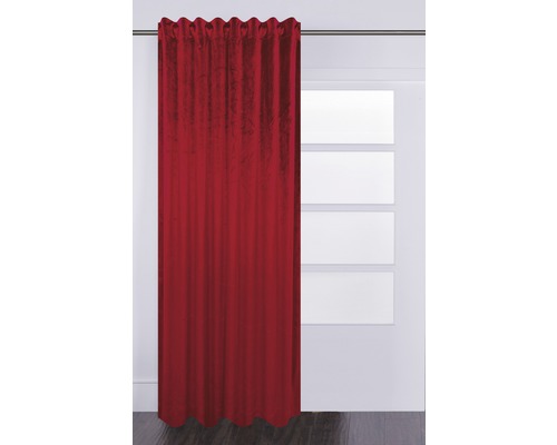 Gardin av tyg med öljetter framför ett fönster