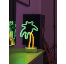 Neonlampa i form av en palm som dekoration
