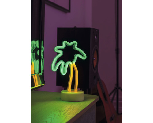 Neonlampa i form av en palm som dekoration