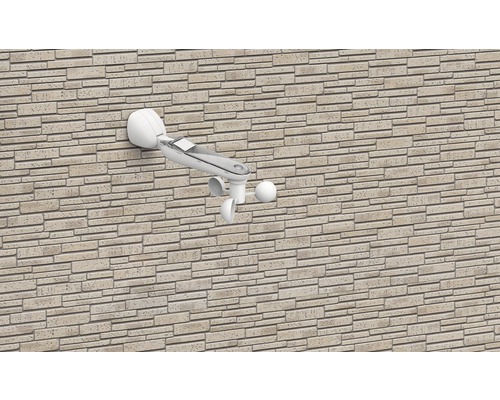 Väderstation för mätning av vindhastighet och vindriktning på en husvägg